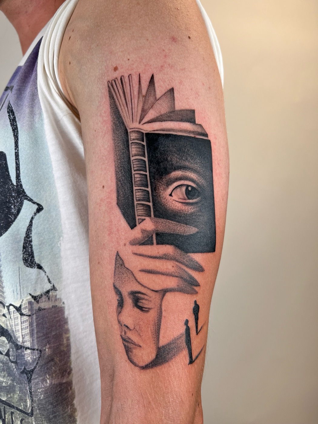 Book + eye + face surrealist composition (arm)