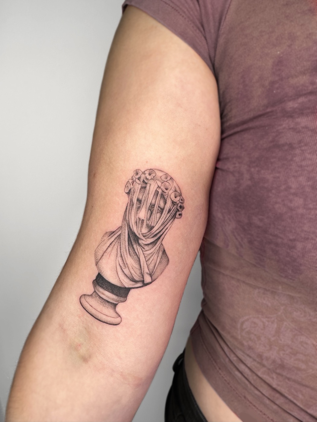 Veiled bust sculpture with flowers (arm)
