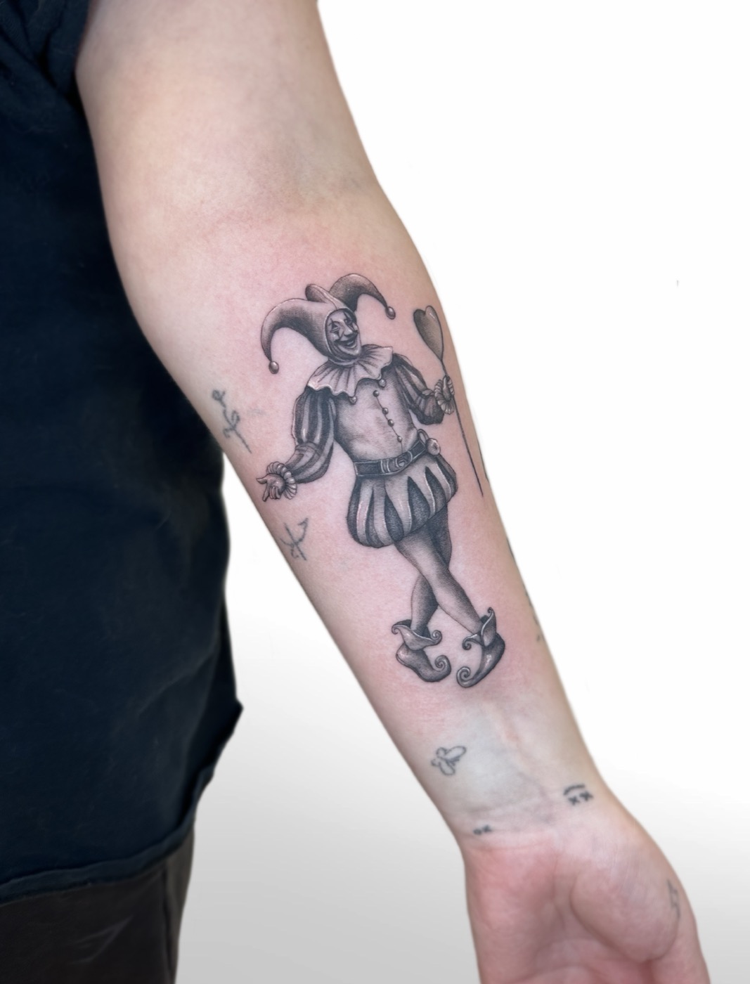 Renaissance jester with balloon (forearm)